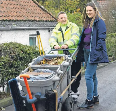  ?? Picture: Dougie Nicolson. ?? Street sweeper Ian Young with Helen McBain in Falkland.