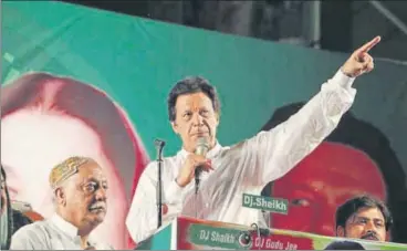  ?? AP FILE ?? Future tense: Imran Khan won the premiershi­p with a slim majority of four votes.