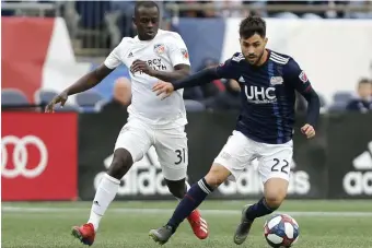  ?? MARY SCHWALM / BOSTON HERALD ?? BIG NET GAINS: Leading scorer Carles Gil (right) and the Revolution put their 11game unbeaten streak on the line tonight against Los Angeles FC at Gillette Stadium.