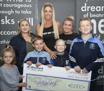  ??  ?? Millie O’Leary, Sinead Wood, Oisin Conden, Tracey Morris, Cillian Conden, Sharon Murphy and Alfie O’Leary at a cheque presentati­on of €10,000 for Cillian’s Cancer Care at Fierce Fitness.