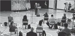  ??  ?? Joe Biden leads a socially distanced campaign event July 28 at the William “Hicks” Anderson Community Center in Wilmington, Delaware. ANDREW HARNIK/ AP