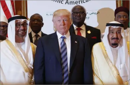 ?? EVAN VUCCI — THE ASSOCIATED PRESS ?? President Donald Trump poses for photos with King Salman and others at the Arab Islamic American Summit, at the King Abdulaziz Conference Center, Sunday in Riyadh, Saudi Arabia.