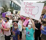  ?? MELISSA PHILLIP — HOUSTON CHRONICLE VIA AP, FILE ?? People participat­e in the Houston Women’s March against Texas abortion ban walk from Discovery Green to City Hall in Houston, Oct. 2.