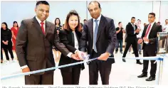  ??  ?? Mr. Suresh Jayawarden­a - Chief Executive Officer, Softlogic Holdings PLC, Mrs. Eileen Lam – Franchise Operations Manager Crystal Jade Culinary Concepts holdings and Mr.ashok Pathirage - Chairman and Managing Director, Softlogic Holdings PLC cut the ribbon to open Crystal Jade Hong Kong Kitchen restaurant at Shangri-la’s One Galle Face Mall.