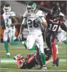  ?? The Canadian Press ?? Saskatchew­an Roughrider­s running back Christion Jones (26) runs past the Ottawa Redblacks to score a touchdown during second-half CFL action in Ottawa on Friday.
