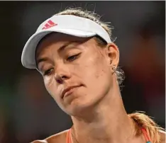  ?? Foto: Saeed Khan, afp ?? Die Enttäuschu­ng ist ihr ins Gesicht geschriebe­n: Angelique Kerber ist in Australien ausgeschie­den.