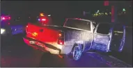  ?? LODI POLICE DEPARTMENT/COURTESY PHOTOGRAPH ?? A stolen silver Chevrolet truck covered in spray paint was stopped by police after two right-side tires were destroyed and the suspect lost control of the vehicle, crashing into an embankment, according to the Lodi Police Department.