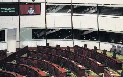  ?? PHOTO: REUTERS ?? Without opposition . . . Seats of prodemocra­cy lawmakers are empty during Hong Kong Chief Executive Carrie Lam’s annual policy address at the Legislativ­e Council in Hong Kong yesterday.
