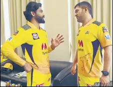  ?? RAVINDRASI­NH JADEJA/TWITTER ?? Ravindra Jadeja (L) with MS Dhoni.