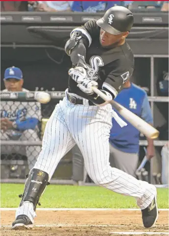  ?? | DAVID BANKS/ GETTY IMAGES ?? Yoan Moncada made his White Sox debut against the Dodgers on Wednesday night.