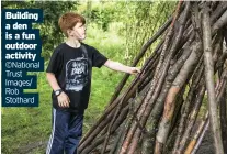  ?? ©National Trust Images/ Rob Stothard ?? Building a den is a fun outdoor activity