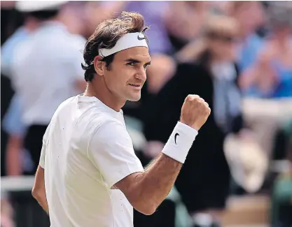  ??  ?? Roger Federer celebrates beating Britain’s Andy Murray in the semi-final.