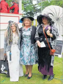  ??  ?? Mayor Tracey Collis with the placegette­rs in the Adult Costume Competitio­n. From left: Second placed Lorraine Edgar of Feilding and first placed Bridie Thomas of Palmerston North.