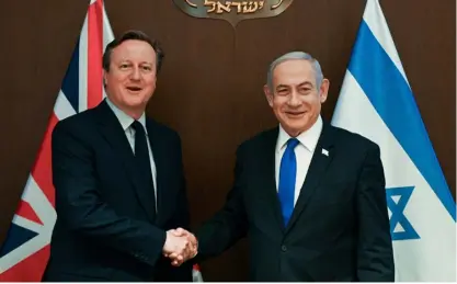  ?? Zelenskyy photograph: Ukrainian Presidenti­al Press O ce
Cameron and Netanyahu photograph: Israeli Government Press O ce ?? As the Russian invasion of Ukraine spread to Orkhiv, Ukrainian president Volodymyr Zelenskyy seemed to be feeling the fatigue. With Foreign Secretary David Cameron renewing his alliance with Israeli prime minister Benjamin Netanyahu and the Gaza war seemingly his main focus, it begs the question as to which war the UK Government really cares about