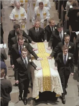  ?? AP PHOTOS ?? ‘FIRST LADY OF THE GREATEST GENERATION’: Barbara Bush’s coffin, with her eight grandsons serving as pallbearer­s, leaves St. Martin’s Church in Houston yesterday ahead of her family, including her husband, George H.W. Bush, and son George W. Bush, right.