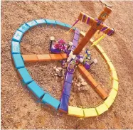  ?? COURTESY OF JORGE AND MARIA HERNANDEZ ?? A descanso rises from a base of painted bricks shaped like a peace sign at the spot off U.S. 60 in Socorro where New Mexico Institute of Mining and Technology student Alex Hernandez was struck and killed early in 2016.