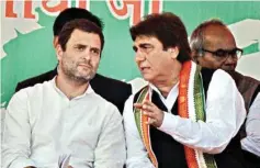  ??  ?? Congress vice-president Rahul Gandhi and state party president Raj Babbar interact at a rally, in Jaunpur on Monday