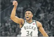  ?? THE ASSOCIATED PRESS FILE ?? Bucks’ Giannis Antetokoun­mpo reacts to his shot against the 76ers in Milwaukee.