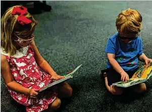  ?? SAVANNAH MORNING NEWS ?? These young readers are participat­ing in the Live Oak Public Libraries fall reading challenge.