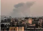  ?? ?? TARGET Smoke billows after Hamas blast