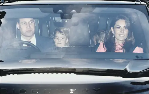  ?? PICTURE: AARON CHOWN/PA ?? The Duke of Cambridge, Prince George and the Duchess of Cambridge leaving the Queen’s Christmas lunch at Buckingham Palace. The lunch is a traditiona­l event for members of the Royal family. However, Camilla, Duchess of Cornwall, had to skip the event because of a cold, although Prince Charles was there with The Duke and Duchess of Sussex.