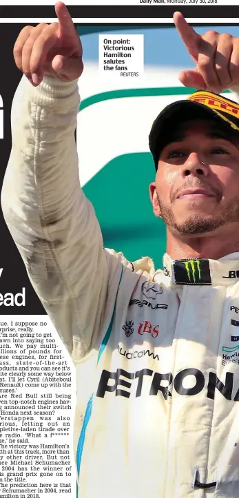  ?? REUTERS ?? On point: Victorious Hamilton salutes the fans