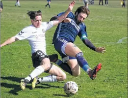  ?? Ref: 14-1421I ?? Ben Perrins (left) attempts a cross for Woolton Hill