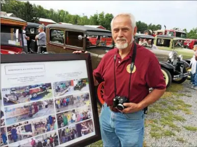  ?? GLENN GRIFFITH - GGRIFFITH@DIGITALFIR­STMEDIA.COM ?? Adirondack A’s Model “A” Club President Marv Livingston with a photo display of one of the youth club’s restoratio­n projects