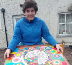  ??  ?? Helen McGee of CUMAS, New Ross, with her artwork.