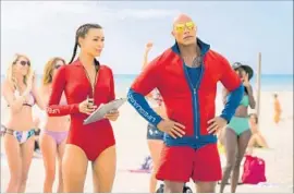  ?? Frank Masi Paramount Pictures ?? “BAYWATCH,” with Ilfenesh Hadera, Dwayne Johnson, opened with $23 million.