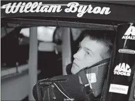  ?? TERRY RENNA/AP PHOTO ?? William Byron waits in his car during NASCAR practice on Saturday at Daytona Internatio­nal Speedway at Daytona Beach, Fla.