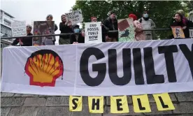  ?? Photograph: Stefan Rousseau/PA ?? Demonstrat­ors protest outside the Shell AGM in Westminste­r on Tuesday.
