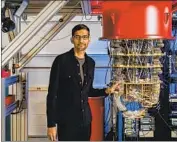  ?? Google ?? GOOGLE Chief Executive Sundar Pichai with a quantum computer at the firm’s Santa Barbara lab.