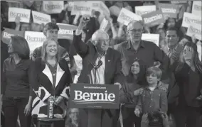  ?? ALEX WONG/GETTY IMAGES ?? Democratic presidenti­al candidate Sen. Bernie Sanders, I-Vt., addresses supporters at his Super Tuesday campaign event in Essex Junction, Vt., on Tuesday.