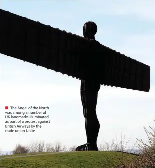  ??  ?? ■ The Angel of the North was among a number of UK landmarks illuminate­d as part of a protest against British Airways by the trade union Unite