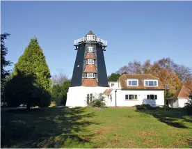  ??  ?? Ireland retired to Rock Mill, an old windmill located near Washington in West Sussex (left). He often took walks on the adjacent South Downs where, while taking a picnic on Harrow Hill near Chanctonbu­ry Ring (right), he once found himself surrounded by...