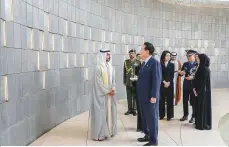  ?? WAM ?? President Yoon and Kim Keon-hee during a visit to Wahat Al Karama where he and his delegation were welcomed by Shaikh Khalifa Bin Tahnoun Al Nahyan.