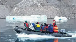  ?? SUBMITTED PHOTO ?? Explorer Dr. Latonia Hartery of Newfoundla­nd and Labrador operates a Zodiac in the Arctic during an expedition.