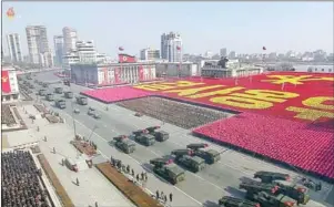  ?? AFP PHOTO/KCTV ?? This screen grab taken from North Korea’s KCTV yesterday shows members of North Korea’s military taking part in a parade in Kim Il-sung Square in Pyongyang.