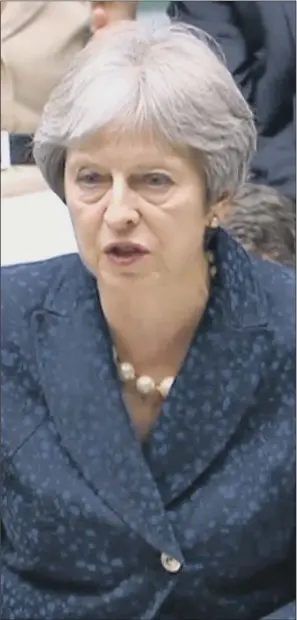  ?? PICTURE: PA WIRE. ?? FACING THE HOUSE: Prime Minister Theresa May updates MPs in the Commons on the Chequers Brexit plan yesterday in the wake of two major Cabinet resignatio­ns.