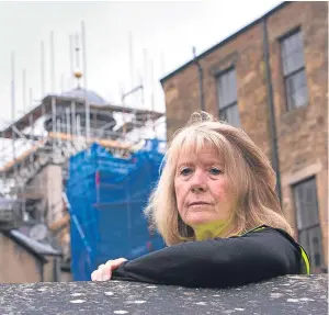  ?? Picture: Steven Brown. ?? Lynn Watt, of joiners John Smart & Son, says the thieves may have thought the gold-leaf cockerel to have been more valuable.