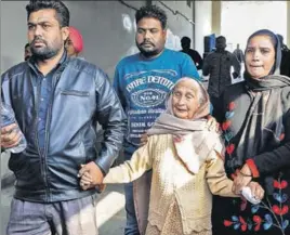  ?? PTI AND HT ?? Inconsolab­le relatives of the victims of the grenade explosion at the Nirankari Bhawan in Rajasansi near Amritsar on Sunday.