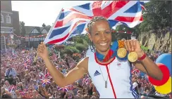  ??  ?? Kelly Holmes’ Victory Parade through Hildenboro­ugh