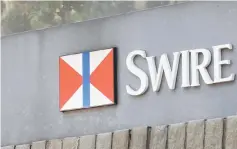  ??  ?? Logo of Swire Group is seen in Hong Kong, China. Loss-making Cathay Pacific Airways Ltd hired McKinsey & Co consultant­s earlier this year to advise on a transforma­tion plan, drawing on turnaround­s at regional rivals such as Qantas Airways Ltd and Japan...