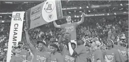  ?? STEPHEN R. SYLVANIE/USA TODAY SPORTS ?? Arizona players celebrate after defeating UCLA to win the Pac-12 Tournament championsh­ip last season in Las Vegas.