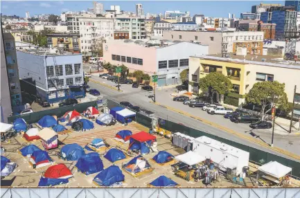  ?? Noah Berger / Special to The Chronicle ?? The costs of citysancti­oned encampment­s like this one on Gough Street are “eyepopping,” an S.F. supervisor says.