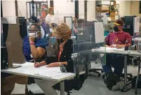  ?? ADRIANA ZEHBRAUSKA­S/NEW YORK TIMES FILE PHOTO ?? Election workers count ballots in November at the Maricopa County Recorder’s office in Phoenix. In arguments heard Tuesday, the Supreme Court seemed ready to uphold two Arizona voting restrictio­ns, including requiring election officials to discard ballots cast at the wrong precinct.