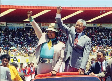  ?? Picture: Adil Bradlow/PictureNET Africa ?? POWER COUPLE: Nelson Mandela takes the clenched fist salute with his then-wife Winnie Madikizela-Mandela as they complete a lap of honour at the Free State stadium in Bloemfonte­in on January 8, 1992.