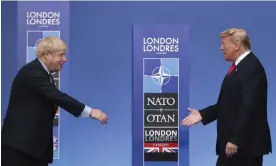  ?? Photograph: Francisco Seco/AP ?? ‘American democracy had a near-death experience with Trump, and the Conservati­ve party was fellow-travelling with the assassin.’ Boris Johnson and Donald Trump at a Nato leaders meeting in 2019.