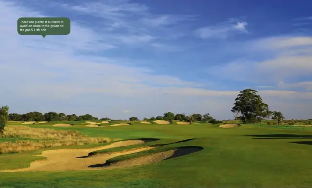  ??  ?? There are plenty of bunkers to avoid en route to the green on the par-5 11th hole.